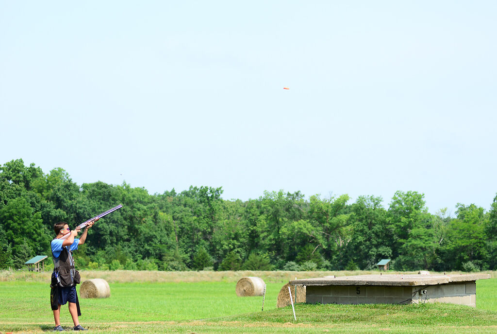 An orange target rockets through the air as Ben Steelman takes aim